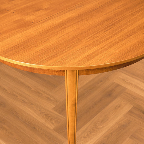 Swedish round dining table in teak and beech