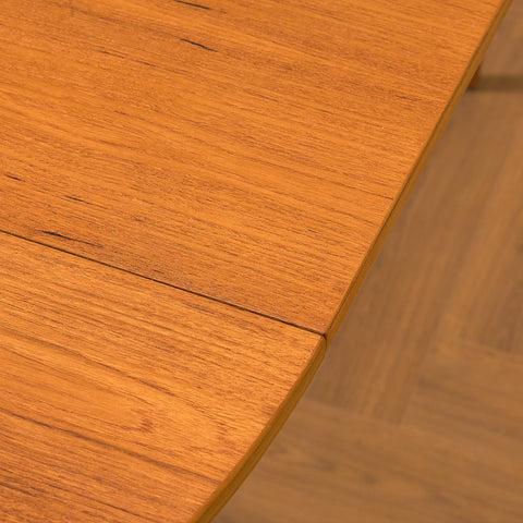 Swedish round dining table in teak and beech