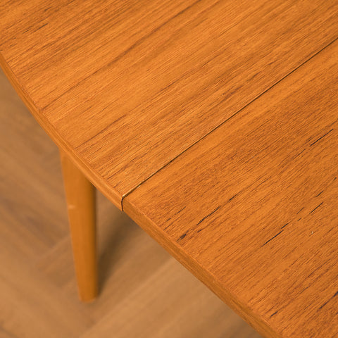 Swedish round dining table in teak and beech