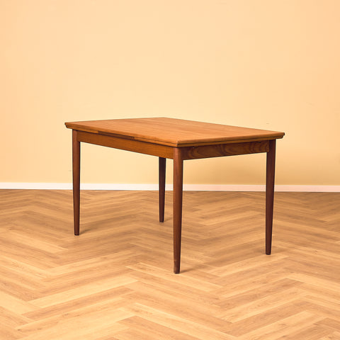 Danish rectangular dining table in teak and walnut