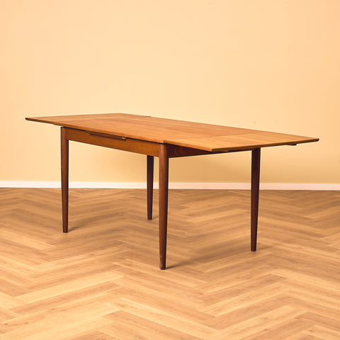 Danish rectangular dining table in teak and walnut