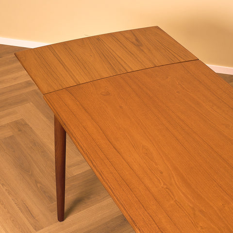 Danish rectangular dining table in teak and walnut