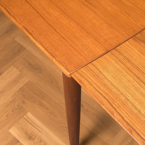 Danish rectangular dining table in teak and walnut