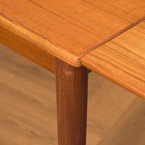 Danish rectangular dining table in teak and walnut
