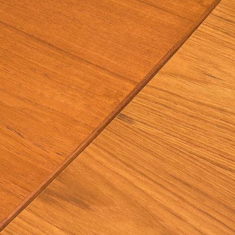 Danish rectangular dining table in teak and walnut