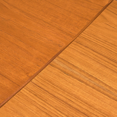 Danish rectangular dining table in teak and walnut