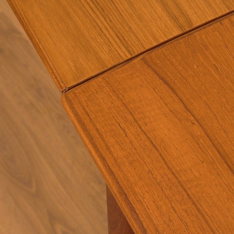 Danish rectangular dining table in teak and walnut