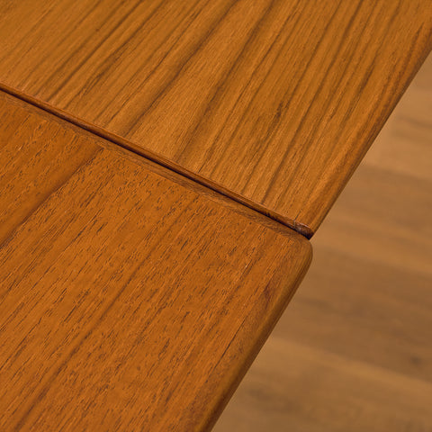 Danish rectangular dining table in teak and walnut