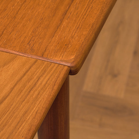 Danish rectangular dining table in teak and walnut