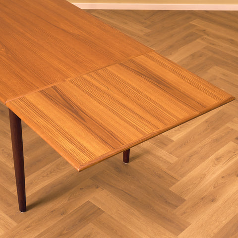 Danish rectangular dining table in teak and walnut by N&R Møbler