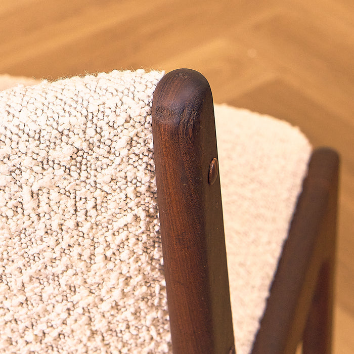Erik Buch Model 89 Dining Chair in Walnut and Bouclé, close-up of the backrest post top in walnut