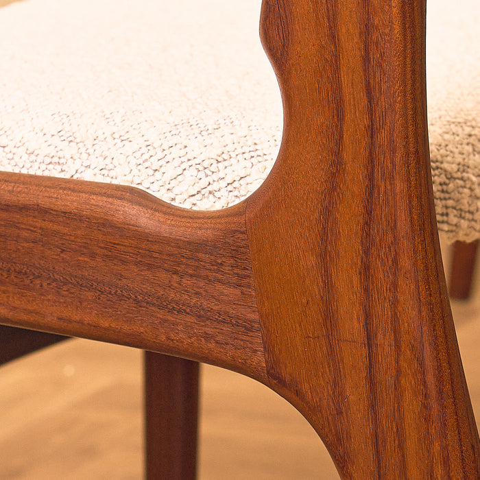 Erik Buch Model 89 Dining Chair in Walnut and Bouclé, close-up of the rear leg curve in walnut
