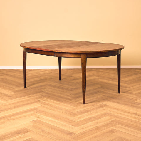 Danish round dining table in Santos rosewood by Omann Jun, model 55