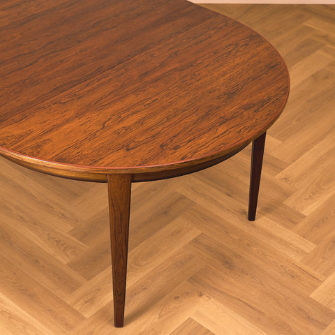 Danish round dining table in Santos rosewood by Omann Jun, model 55