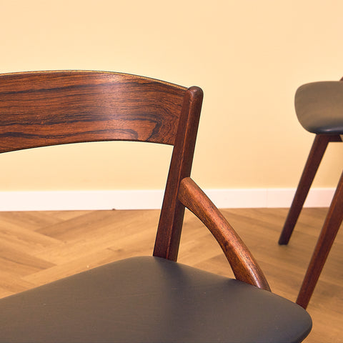 Danish dining chairs in teak and Santos rosewood by Dyrlund
