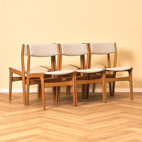 Danish set of 4 dining chairs in solid oak by Erik Buch