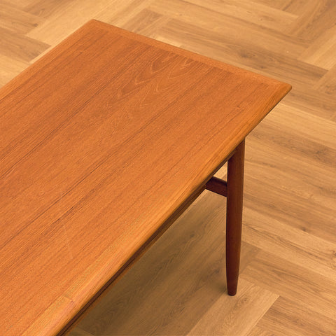 Danish Teak Coffee Table with Lower Shelf, close-up of the top surface in teak