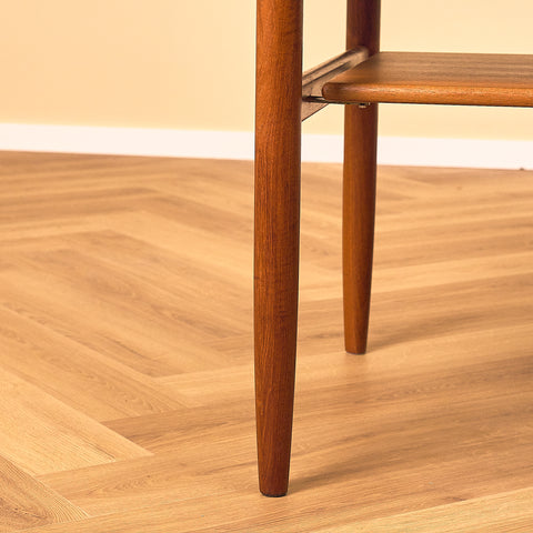 Danish Teak Coffee Table with Lower Shelf, close-up of the tapered legs in teak