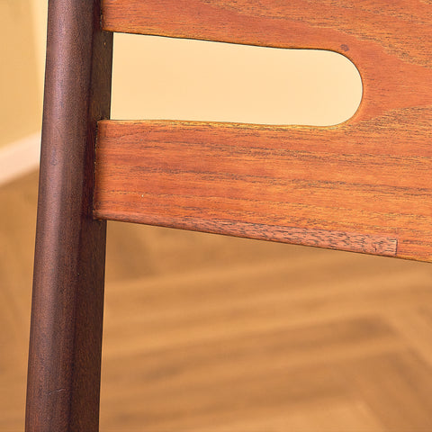 Danish dining chairs in teak and walnut