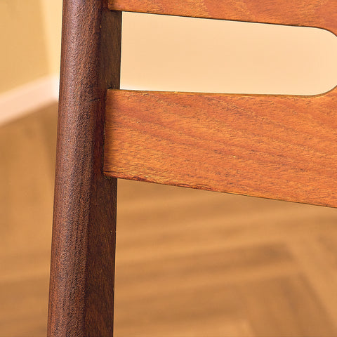 Danish dining chairs in teak and walnut