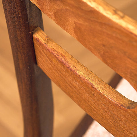 Danish dining chairs in teak and walnut