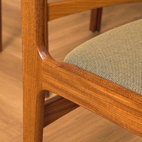 Danish dining chairs in walnut by Erik Buch for Nova Stolefabrik