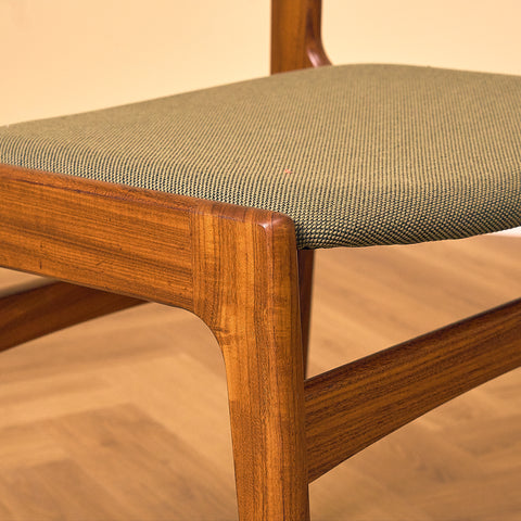 Danish dining chairs in walnut by Erik Buch for Nova Stolefabrik