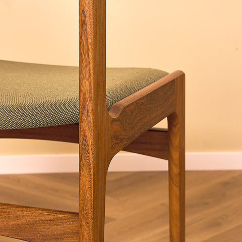 Danish dining chairs in walnut by Erik Buch for Nova Stolefabrik