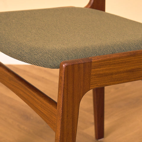 Danish dining chairs in walnut by Erik Buch for Nova Stolefabrik