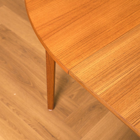 Swedish round dining table in teak