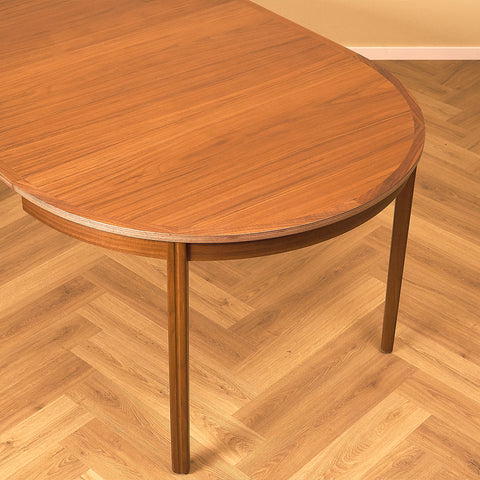 Swedish round dining table in teak and beech