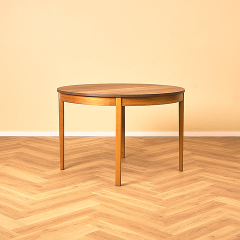 Swedish round dining table in teak by Nils Jonsson for Troeds