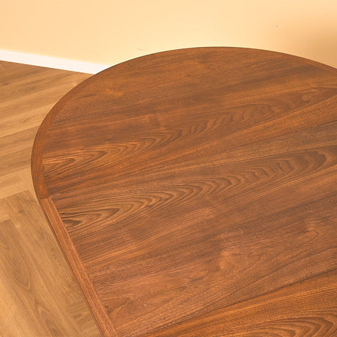 Swedish round dining table in teak by Nils Jonsson for Troeds