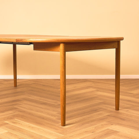 Extendable Round Teak Dining Table