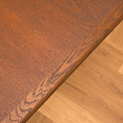 Danish dining table in teak and walnut