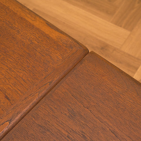 Danish dining table in teak and walnut