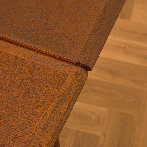 Danish dining table in teak and walnut
