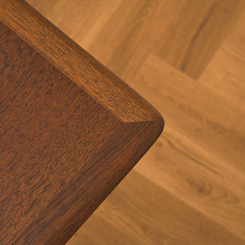 Danish dining table in teak and walnut