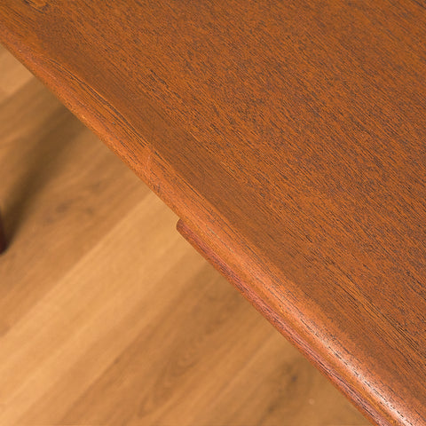 Danish dining table in teak and walnut