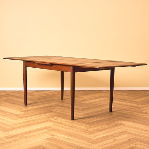 Danish dining table in teak and walnut