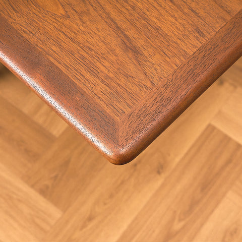 Danish dining table in teak and walnut