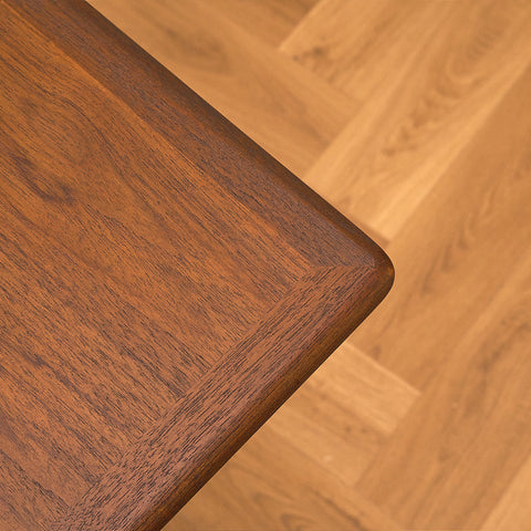 Danish dining table in teak and walnut