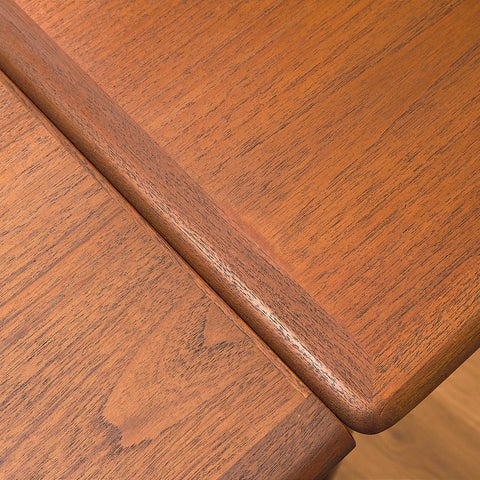 Danish dining table in teak and walnut