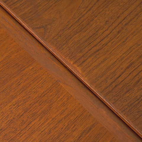Danish dining table in teak and walnut