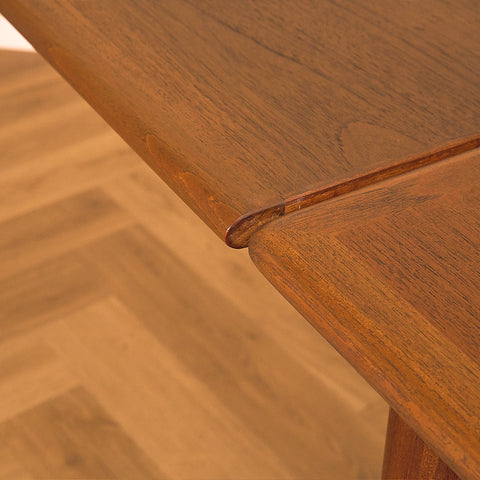Danish dining table in teak and walnut
