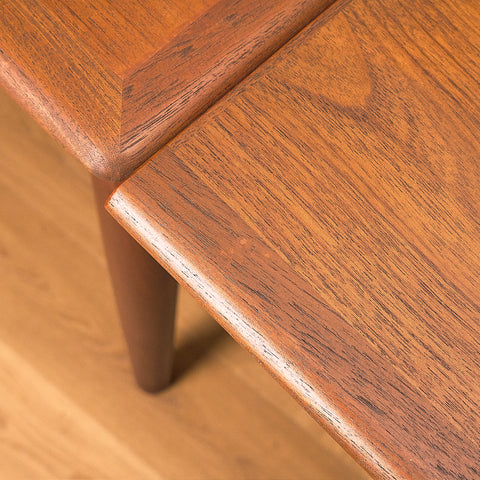 Danish dining table in teak and walnut