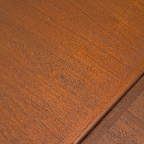 Danish dining table in teak and walnut