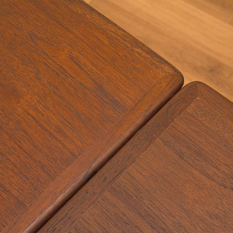 Danish dining table in teak and walnut