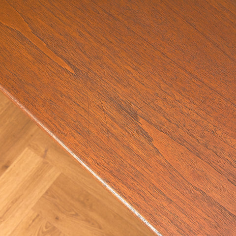 Danish dining table in teak and walnut