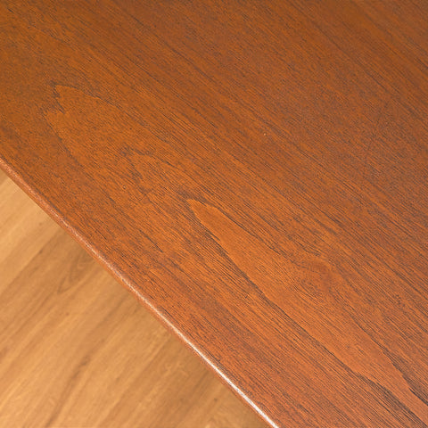 Danish dining table in teak and walnut